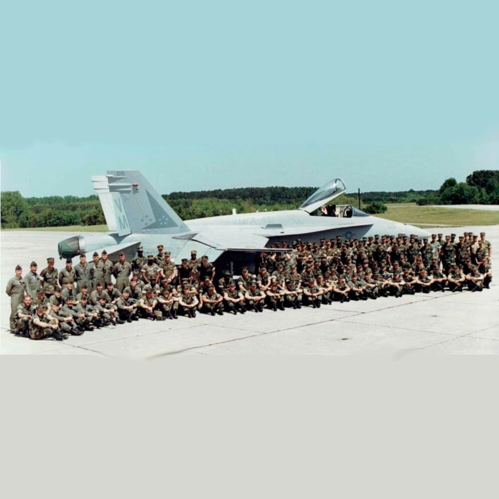Spook and his squadron mates with an F/A-18 Hornet