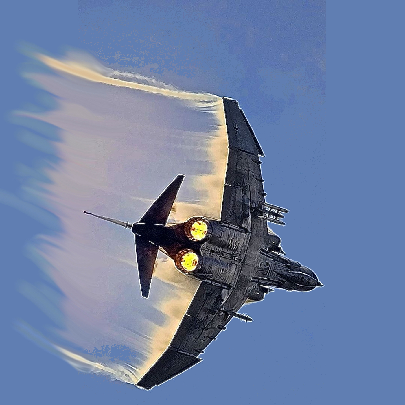 F-4 Phantom in a hard turn away in full afterburner