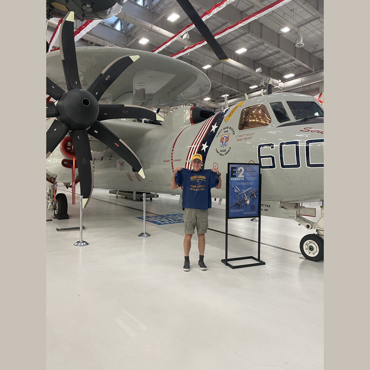 Capt Spalding in front of an E-2 with his AOCS Class Shirt!