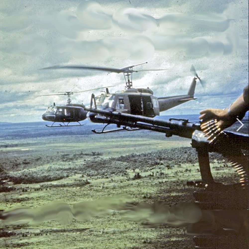 USMC UH-1 Huey Helicopter Gunship in flight